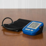 Homedics Upper Arm Blood Pressure Monitor on desk