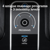 Woman sitting on couch with family while enjoying a massage from the Homedics Therapist Select Foot and Calf Massager