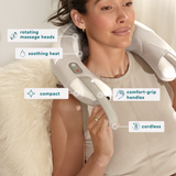 Close up view of woman leaning back in chair while enjoying her Homedics Shiatsu Rechargeable Neck Massager with Heat